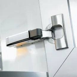 Adaptateur BLUMOTION avec amortisseur pour charnières à semi-recouvrement