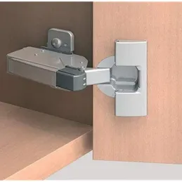 Adaptateur BLUMOTION avec amortisseur pour charnières à semi-recouvrement