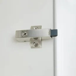 Adaptateur BLUMOTION avec amortissement entre les charnières