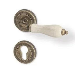 Poignée sur rosace CERAN / Bronze patiné - porcelaine blanche