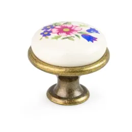 Poignée bouton LUNAS / Laiton antique – motif floral