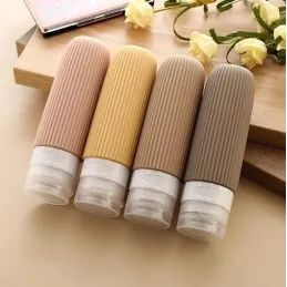 Set de voyage de flacons en silicone pour produits cosmétiques EMPORA / Doré