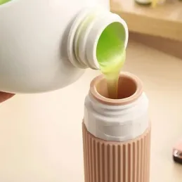 Set de voyage de flacons en silicone pour produits cosmétiques EMPORA / Doré