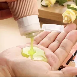Set de voyage de flacons en silicone pour produits cosmétiques EMPORA / Doré