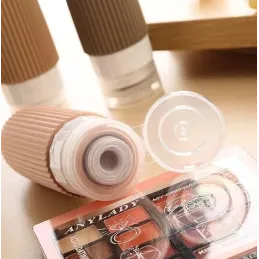 Set de voyage de flacons en silicone pour produits cosmétiques EMPORA / Doré