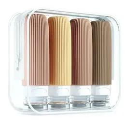 Set de voyage de flacons en silicone pour produits cosmétiques EMPORA / Doré