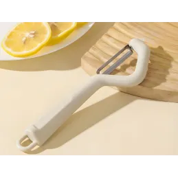Éplucheur universel pour légumes et fruits / Blanc