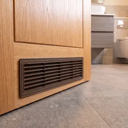 Grille de ventilation double face pour porte 430 x 115 mm / Marron foncé